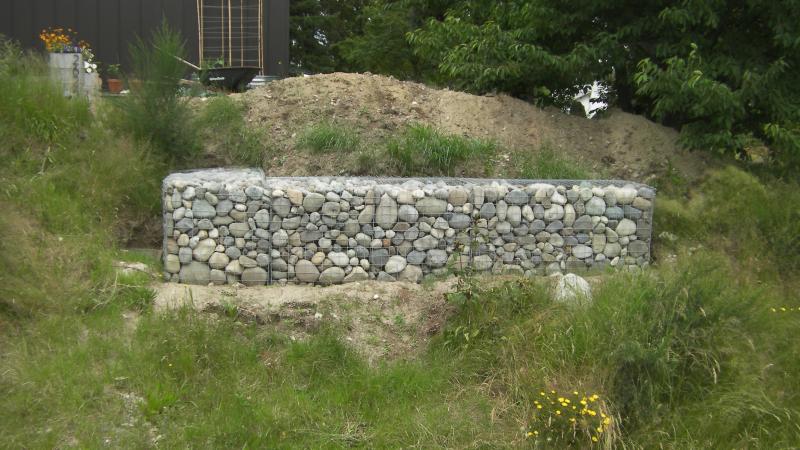 Our 3 to 8 inch cobble rock being used in a steel gabion cage for a homeowner.