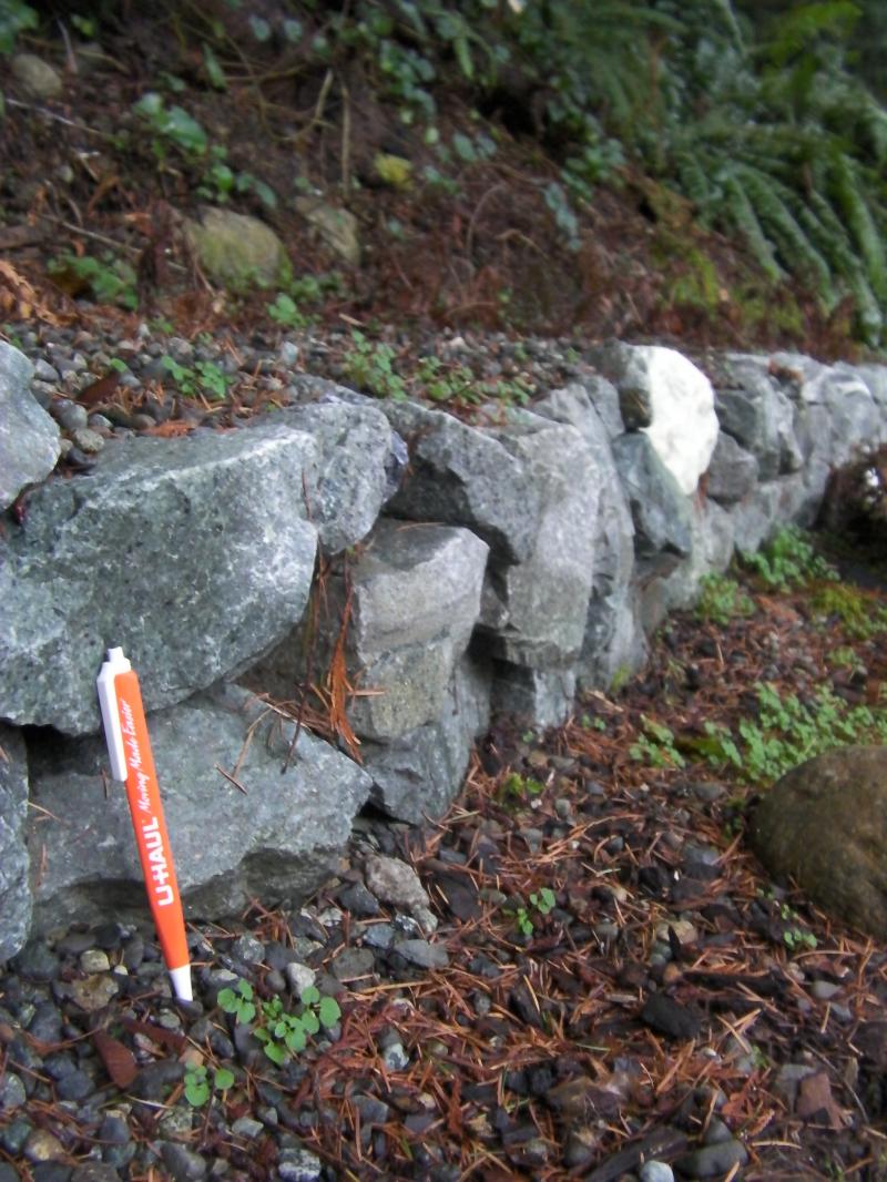 Our lime stone 2 to 4 inch quarry rock used for a small rock wall and border.